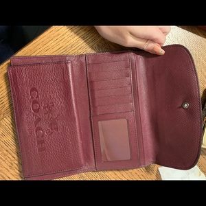 Maroon coach wallet